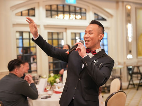 Mike Tan Male Emcee hosting a dinner graduation event