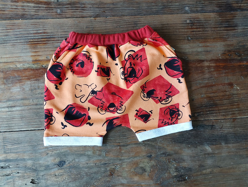 Miniatura: Short moletom careca bainha virada