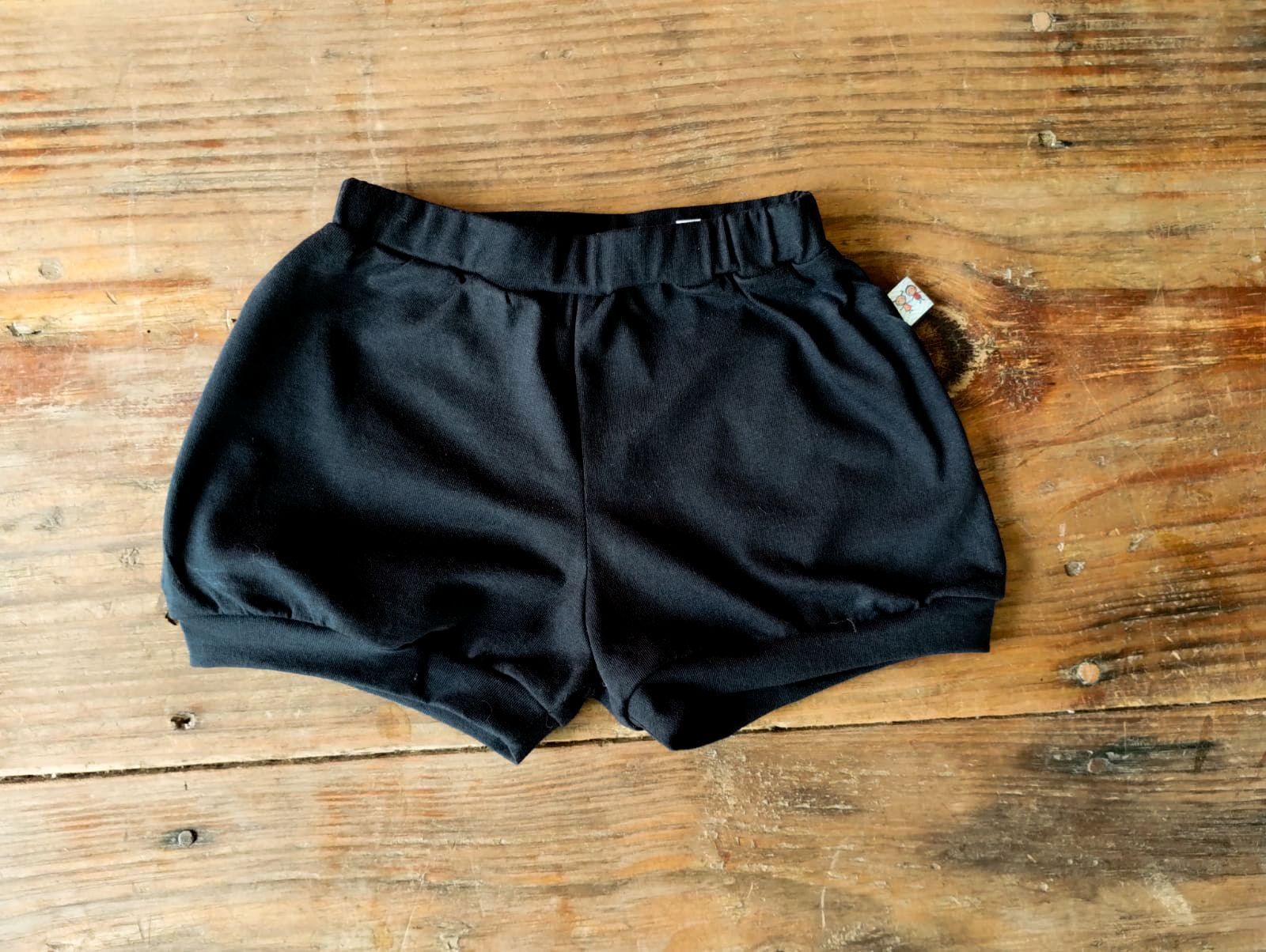 Short 100% algodão bainha com punho