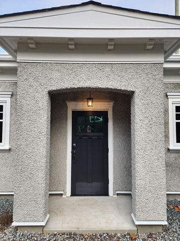 Entrance of garage build showcasing new door