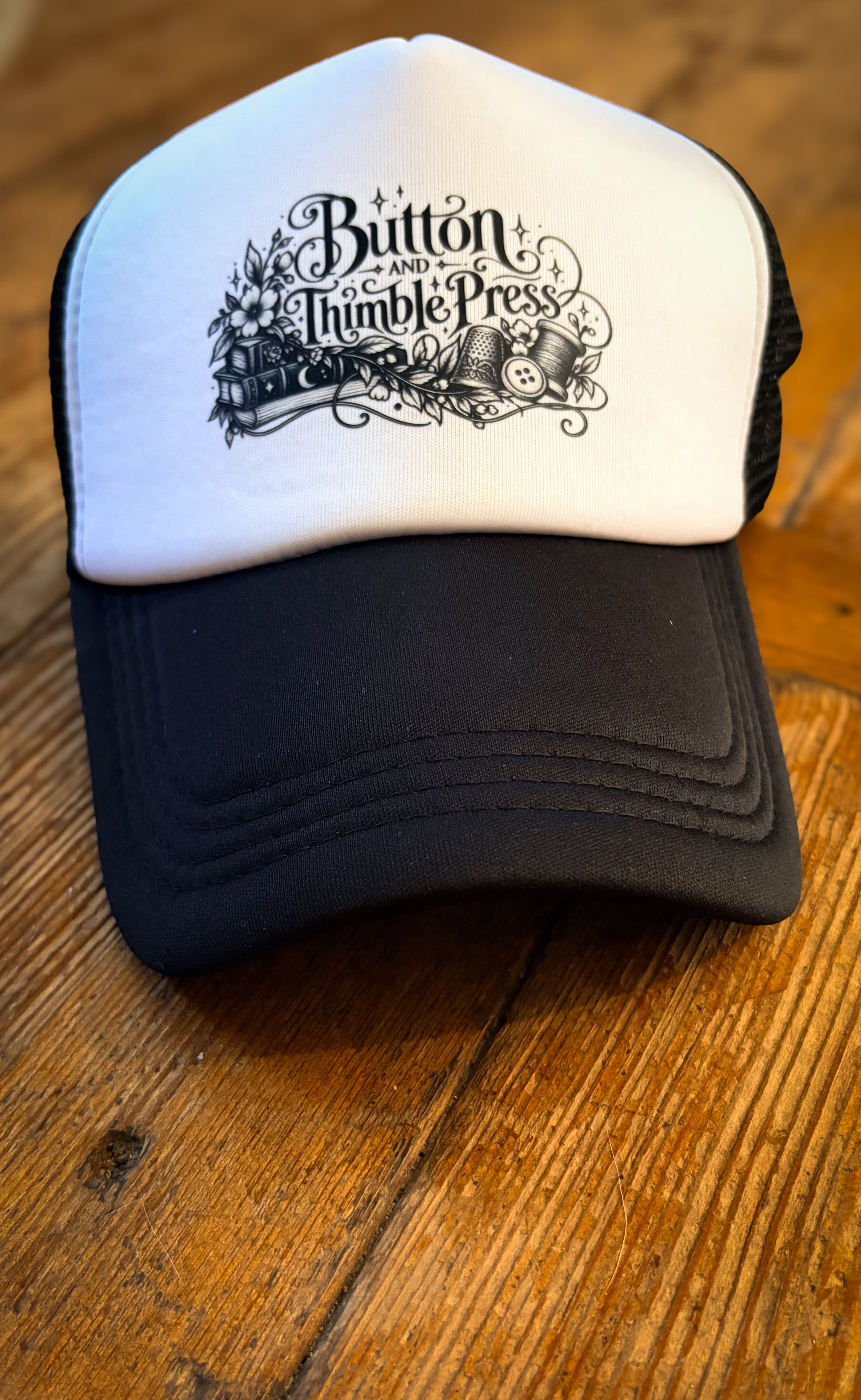 Button & Thimble Press Trucker Hat