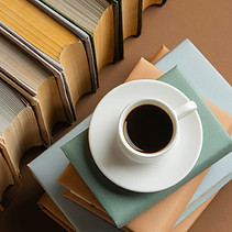 books-arrangement-with-cup-cofee_23-2148851107.jpeg
