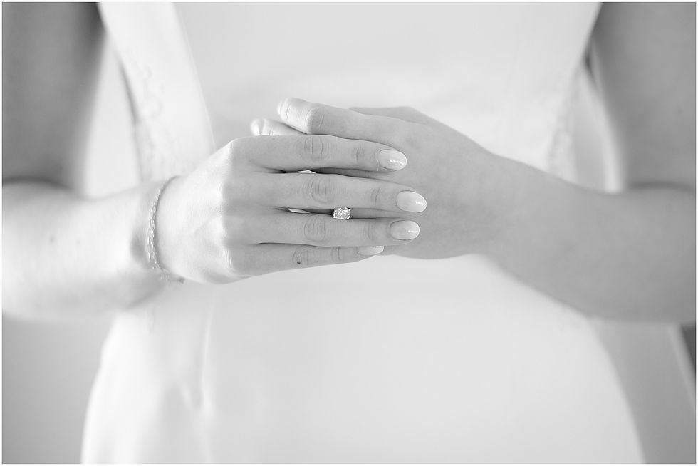 Black and white photo of engagement ring