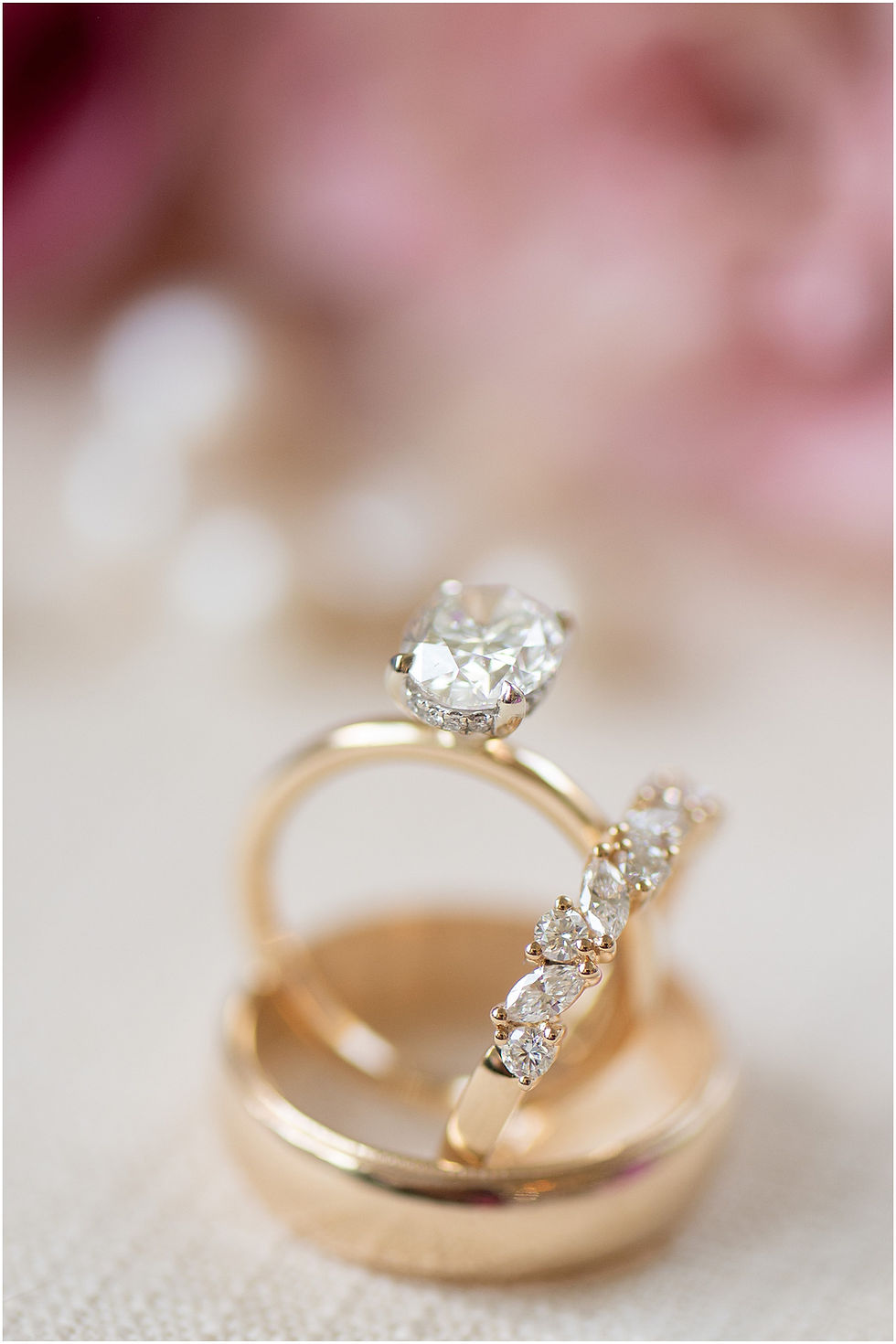 Engagement ring and wedding bands at The Sixpence