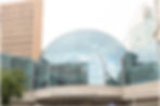 Exterior photo of the blue glass dome of the Indianapolis Artsgarden