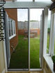 Genius made-to-measure single-door fly screen fitted to a doorway, helping keep insects out while allowing fresh air into the home.