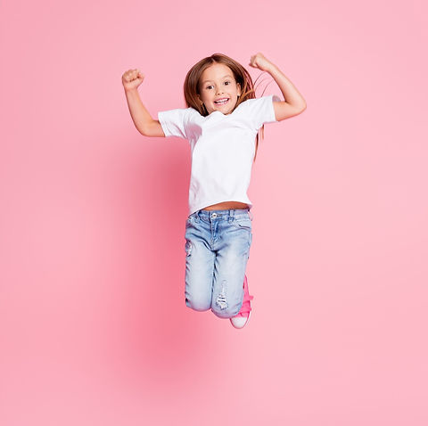 A kid jumping with joy, join our courses for kids, learning english empower them with 21st century skills