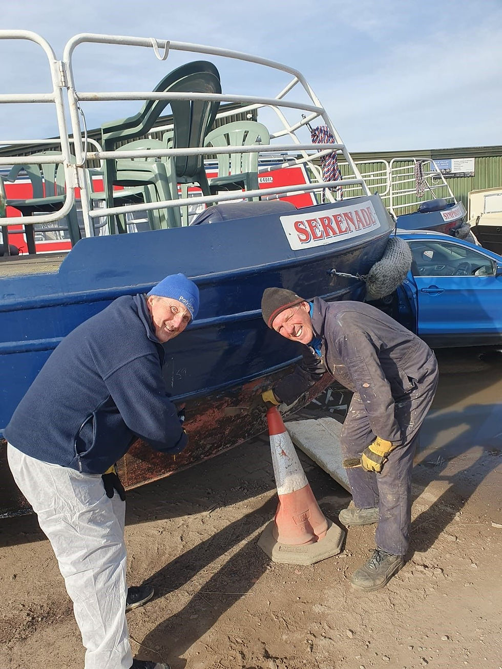 PLMT volunteers blackening Serenade boat