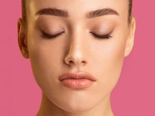 a close up of a young woman's face
