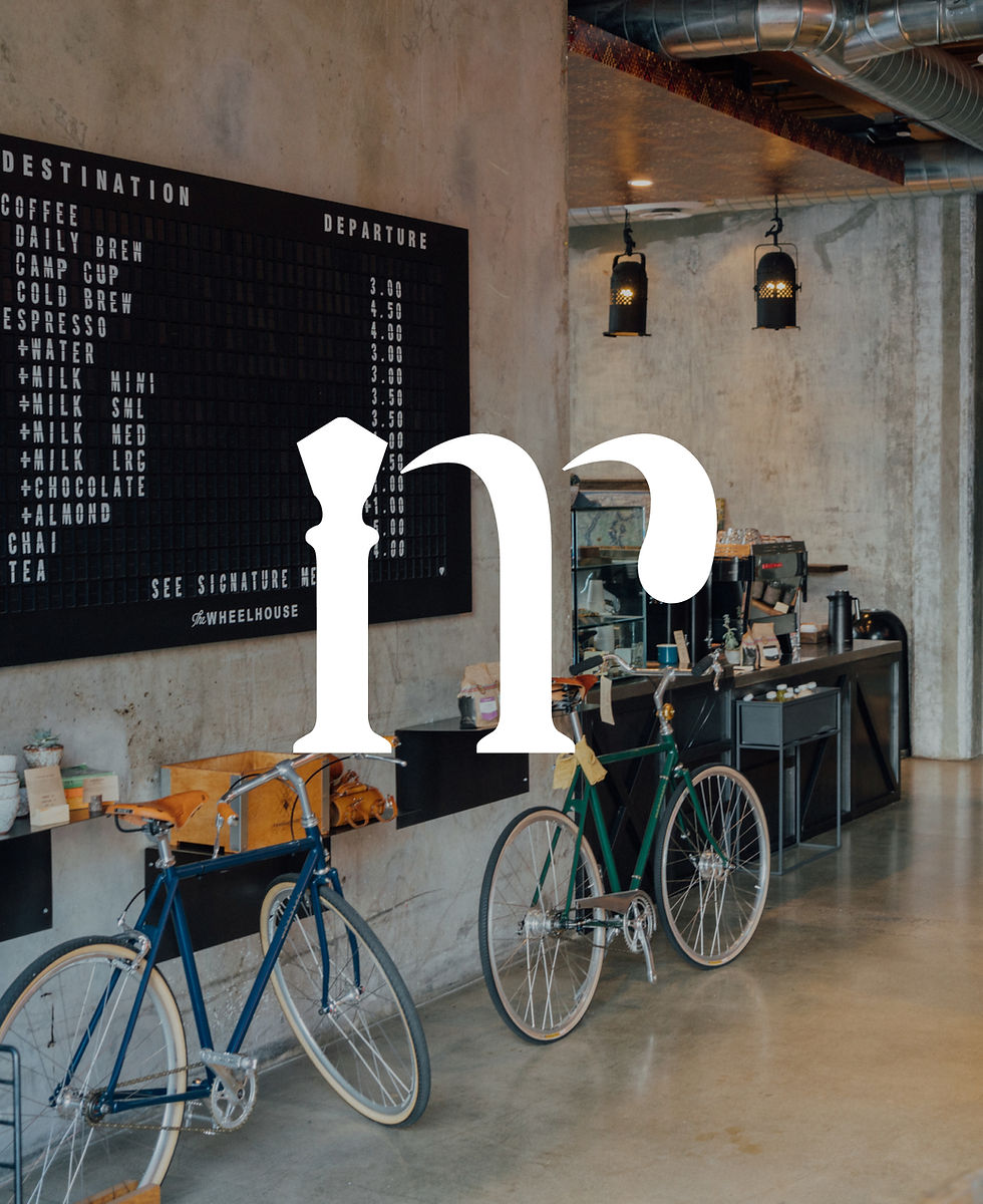 Icon design concept on a Newquay coffee shop on a mock up image over a picture of a coffee shop