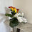 Thumbnail: Orchid Splendour bespoke artificial floral design from a different angle