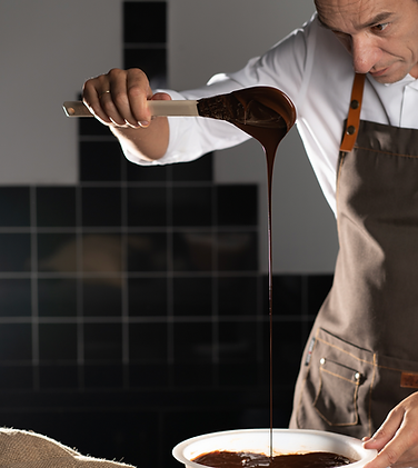 Chocolatier making milk chocolate