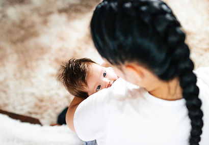 Mother gazing lovingly at baby
