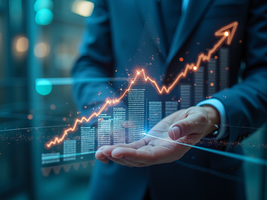 A businessman presents a digital graph on an upward trajectory, symbolizing growth and success in a modern corporate environment.