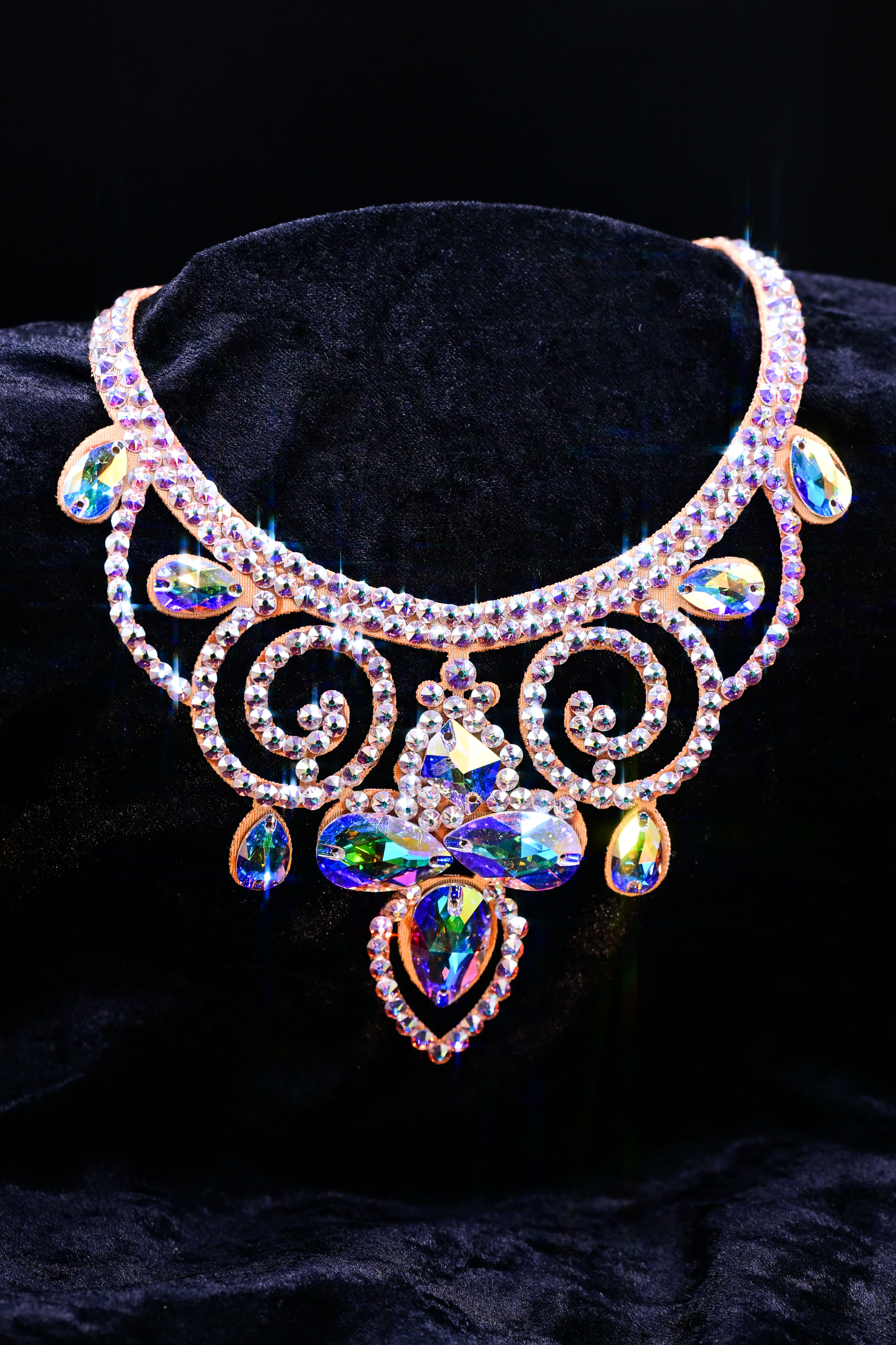 decorative scroll necklace with rhinestone drop accents for performance