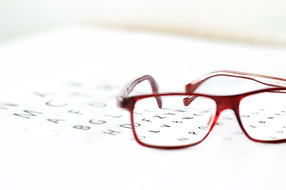 Red Glasses Focused