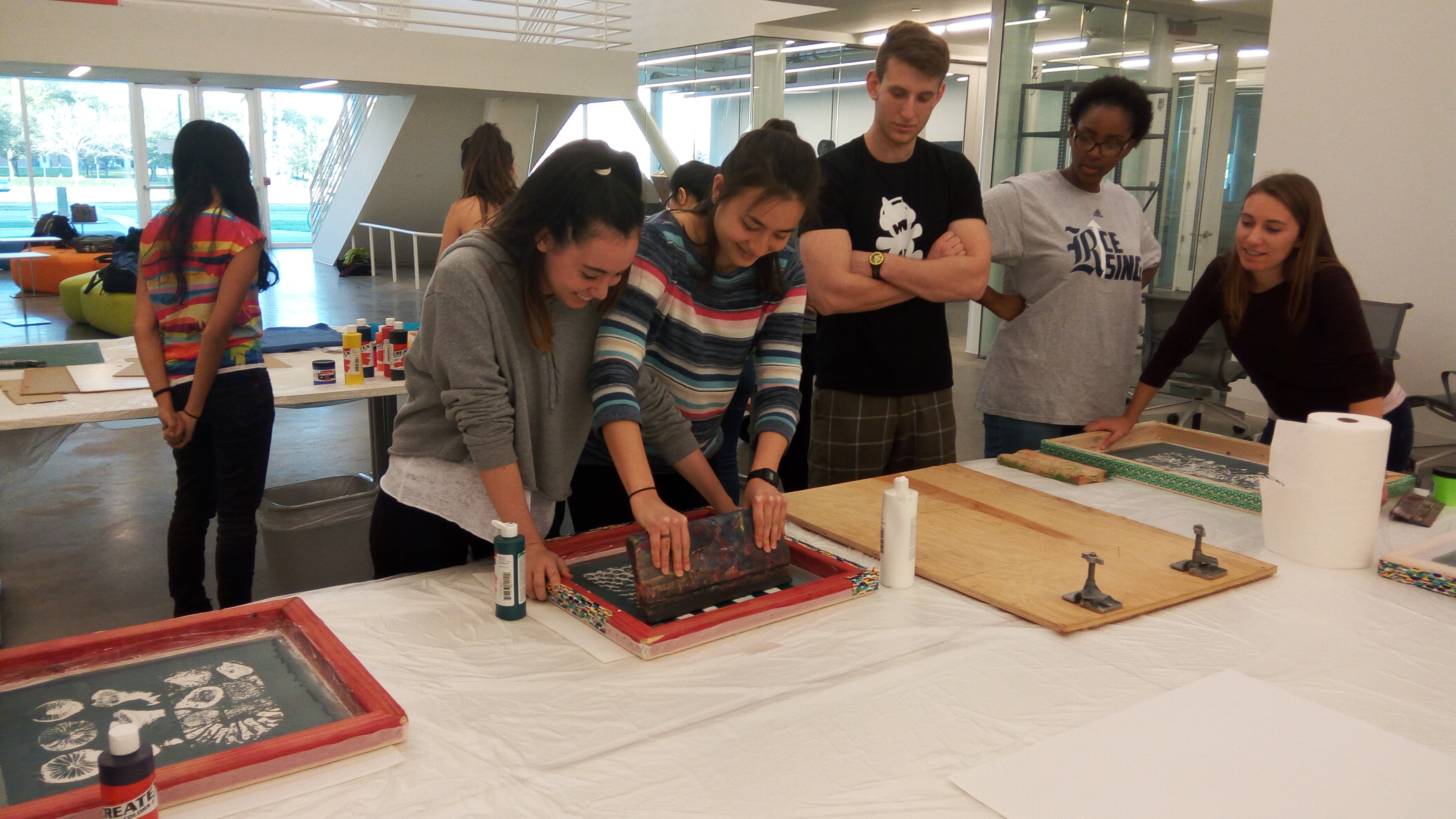 Students screenprint a poster