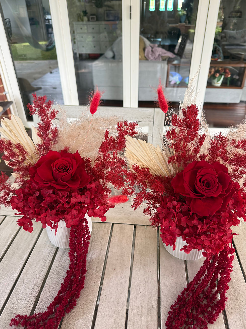 Thumbnail: Small rose arrangement with amaranthus 