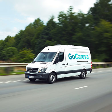 a white cargo van on the highway with the company name GoCareva in teal blue and black on