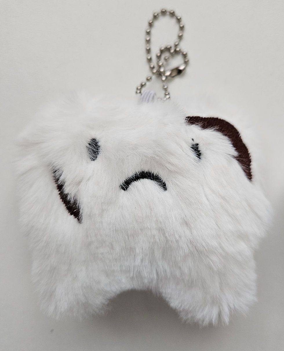 Thumbnail: fluffy tooth decay sad