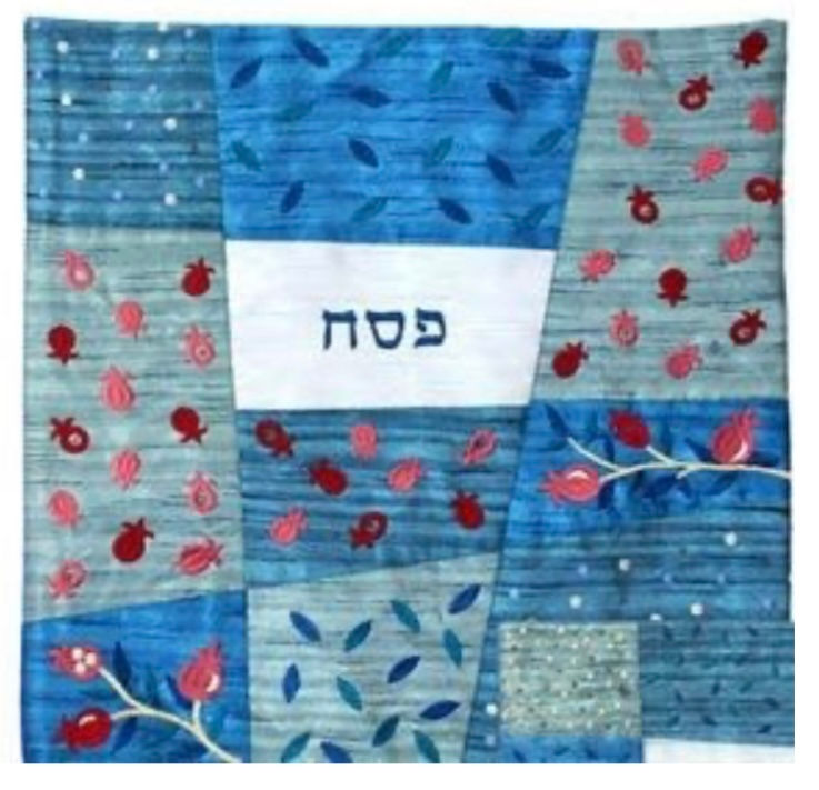 A mozah cover for Passover made with different shades of blue fabric through the art of fabric fusion