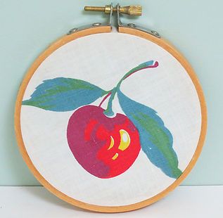 Handmade embroidery hoop swatch portrait with red cherry