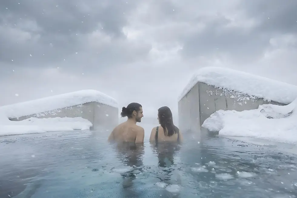 Wooden barrels and stone arches frame a warm pool inside Hürlimannbad & Spa Zurich.