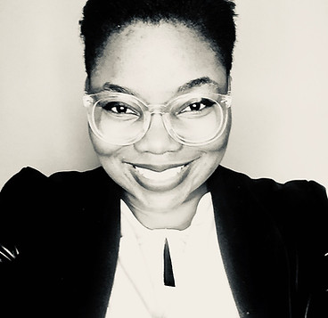 Black Woman Smiling with Glasses