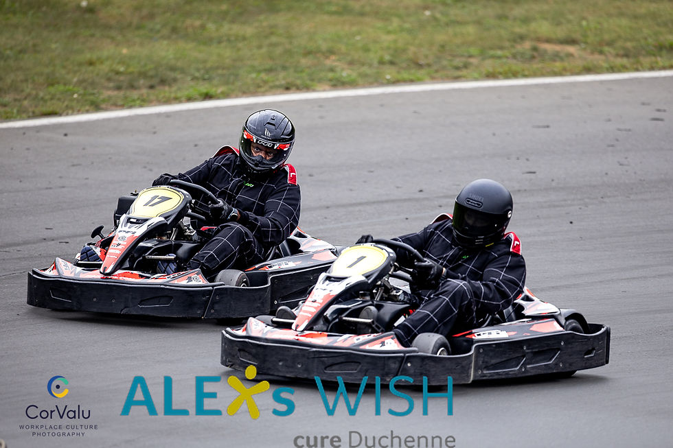 racing go karts cornering at speed.