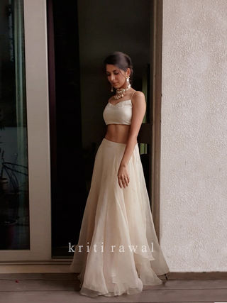 white kriti rawal lehenga.jpg