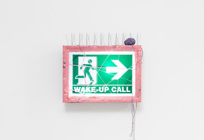 Luca Staccioli, Way out 2023  50 x 52.5 x 16 cm playwood, wood door knockers, candle holder for cake, non-toxic resin, pigments, plexiglass, wool, cotton thread for embroidery, aluminium grid, pigeon spikes and lamps.