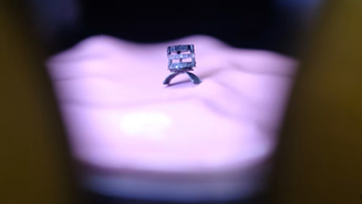Seed-Sized Magnetic Robot Switches Tools in Under One Second