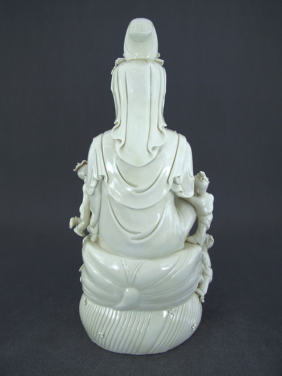 Thumbnail: Blanc de Chine figure of Guanyin (Kwan Yin) 德化窑瓷塑牙白观音童子像