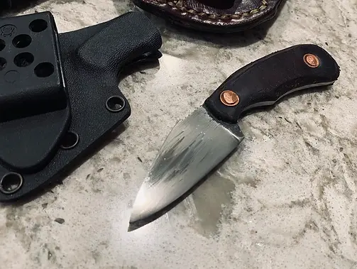 Combat Kestrel Dark Handle.webp