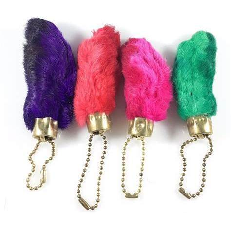 Four colorful vintage rabbit's foot keychains, a classic lucky charm