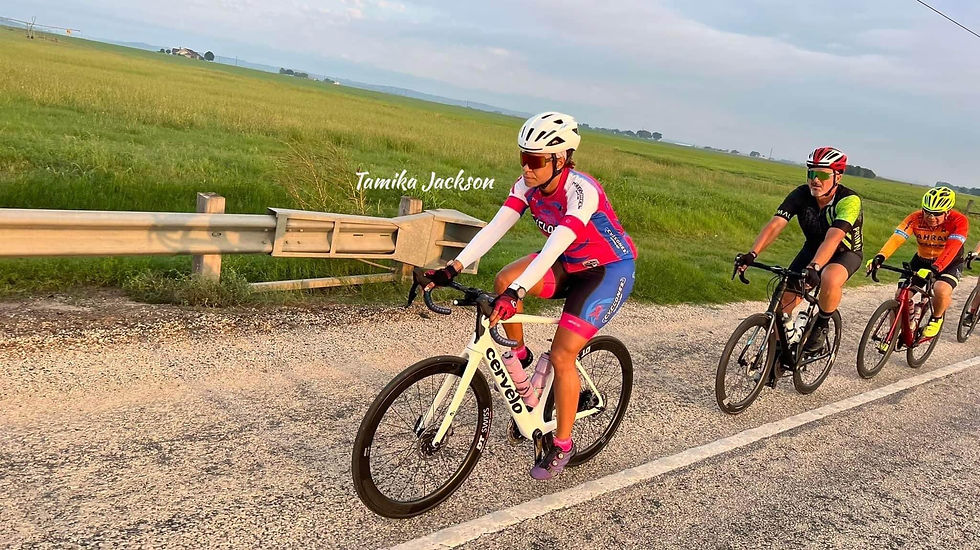Black Female Cyclist in Pace Line Cycling Group Ride