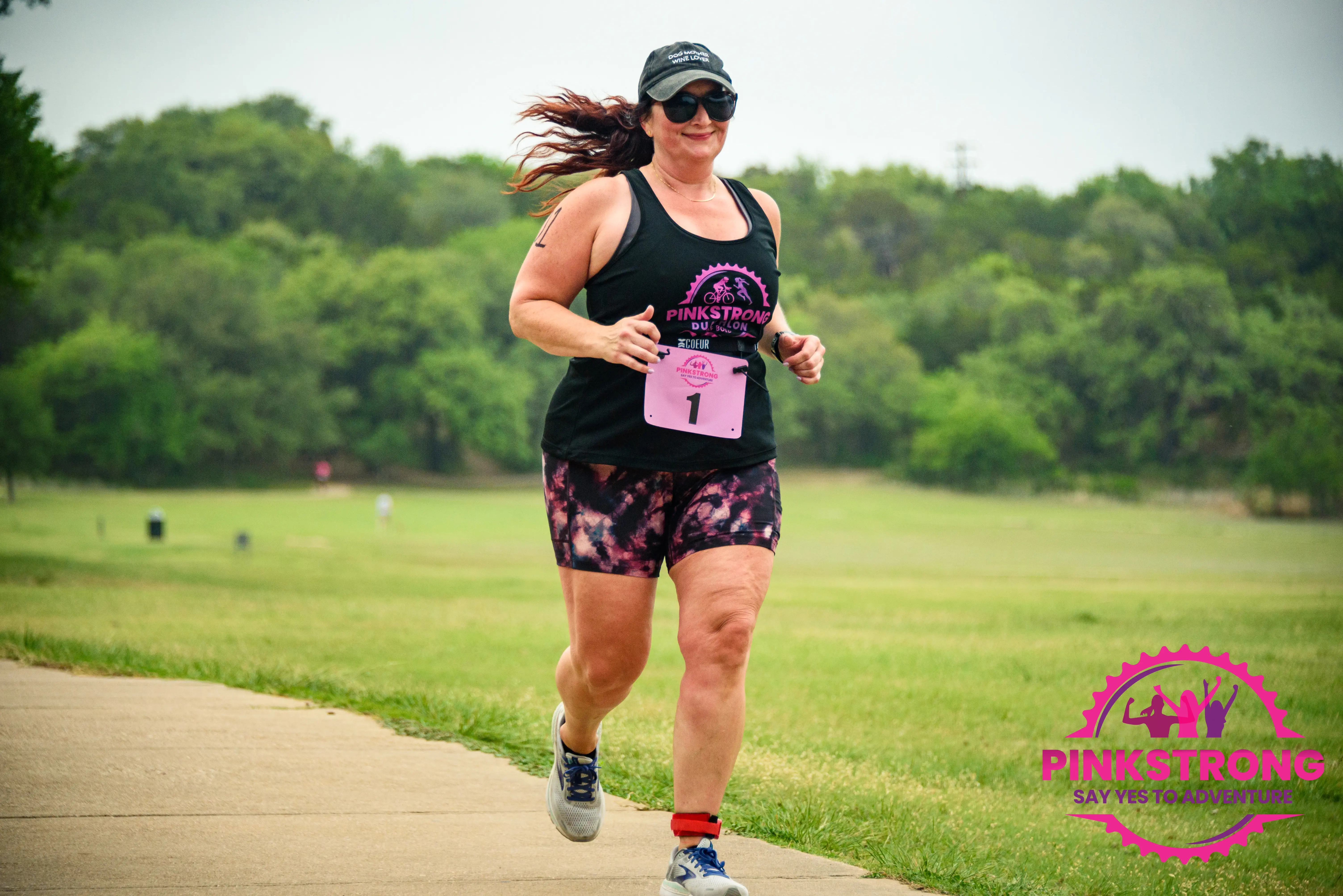 Race Photo of Female Marathon Duathlon Triathlon Runner