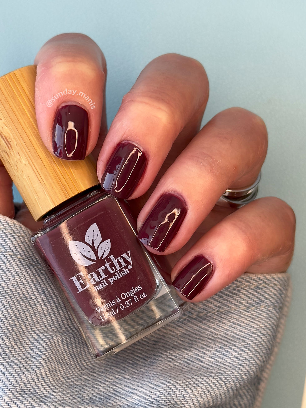 Thumbnail: Earthy Nail Polish Bordeaux Swatch Indoors