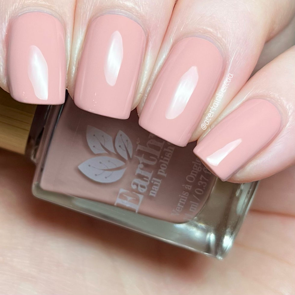dusty pink nail polish swatched with bottle