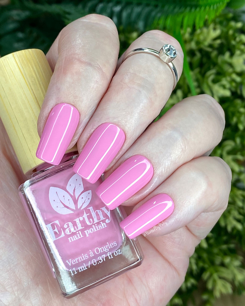 Thumbnail: Primrose applied to nails holding bottle