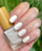 Earthy Polar White swatch with bottle
