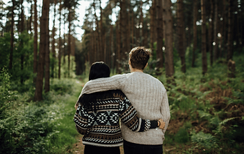 couple with arms around each other outside - dating counseling