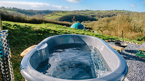 Hot tub with views over the hills in Carmarthenshire for families