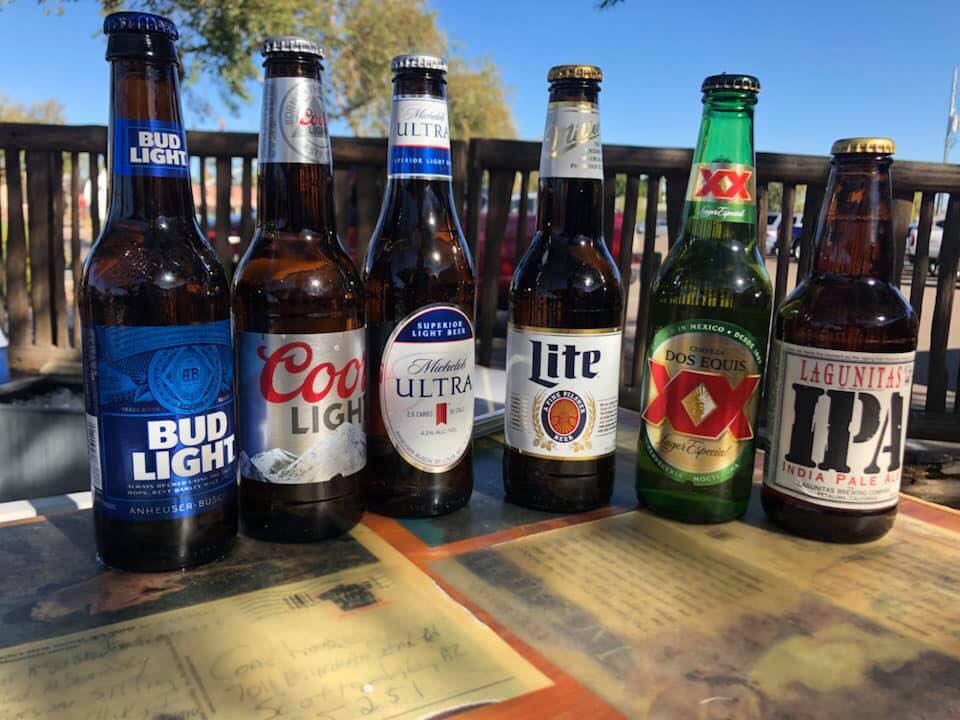 Bottles and cans buried in ice