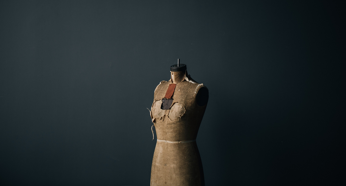 Worn out dress form to represent the fashion industry and the need to move towards more sustainable fashion.