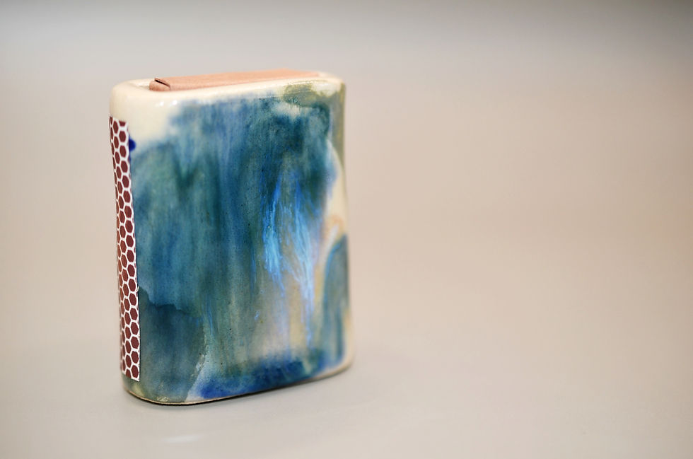 Miniature : Close-up of hand-painted floral matchbox detail