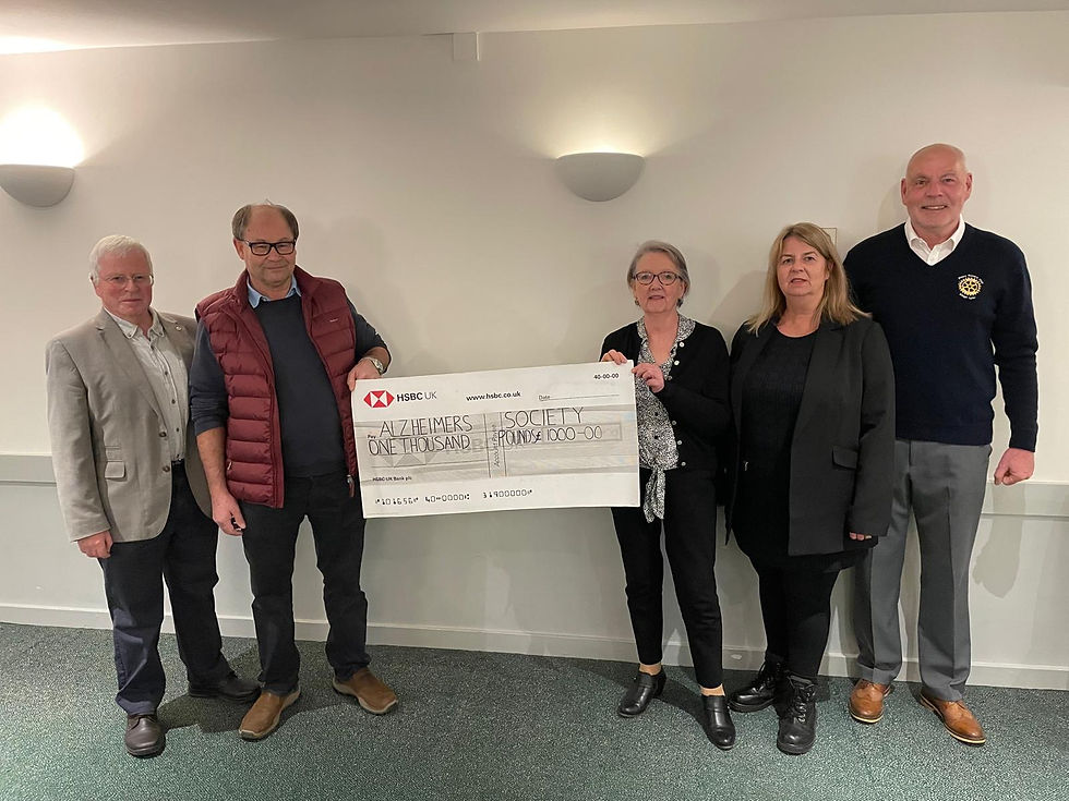 Rotarians Alan Leventhal and Paul Batterham, Alzheimer’s Society volunteers Jacky Phipps and Georgina Clark, and Priory President John Leonard.