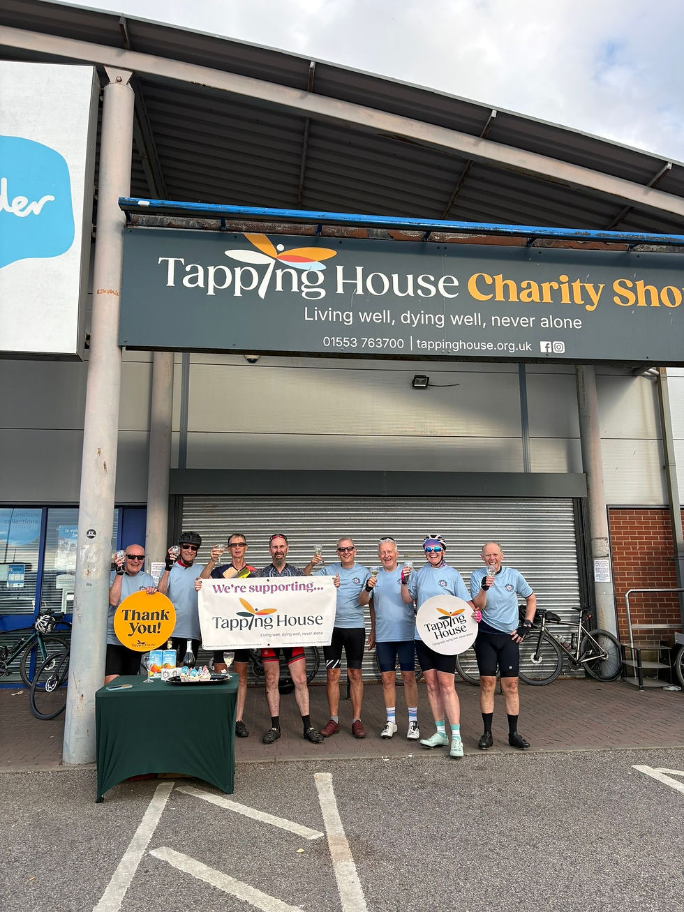 Triumphant cyclists at the end of the Tour de Tapping ride.