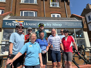 The 2025 Tour de Tapping stop at Hunstanton Tapping House Hospice charity shop.
