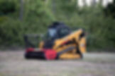 Caterpillar 275 XE with FECON mulcher — high-performance land clearing machine designed for dense brush and rugged terrain in Florida.